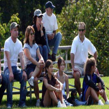 People sitting on portable bleachers