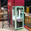 Setting up in tradeshow booth custom claw machine