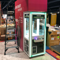 Setting up in tradeshow booth custom claw machine