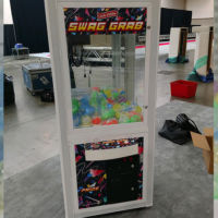 Getting ready for tradeshow with custom claw machine and capsules