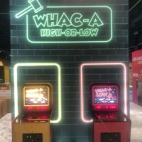 Two custom whack a mole games in trade show booth