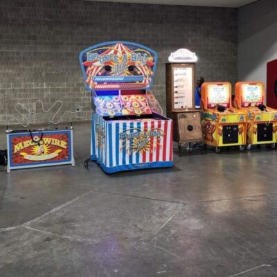 Carnival Theme Event with Mega Wire Carnival Bounce a Ball Love Tester and Whack A Mole Game Rentals