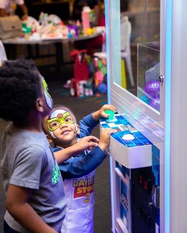 J McAllister Events Custom Claw Machine with Guests