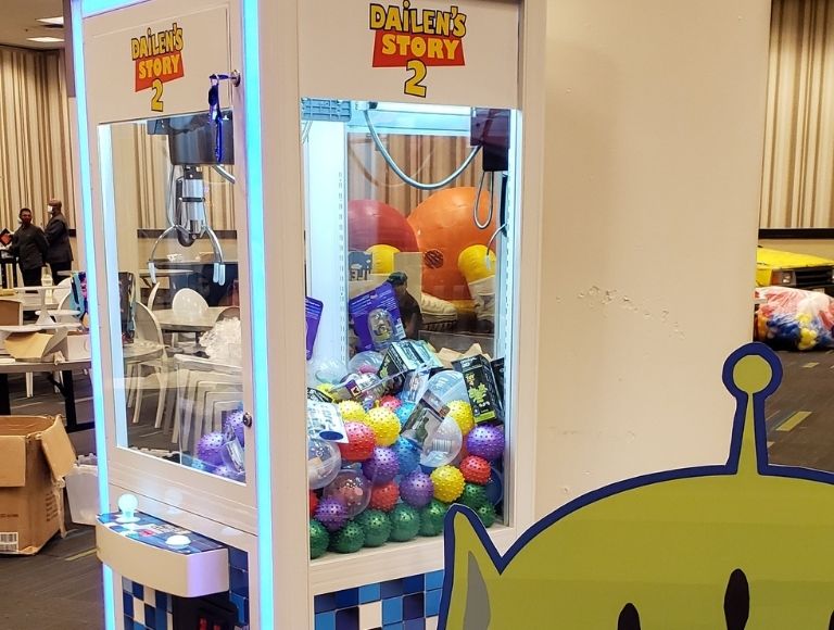 J McAllister Events Custom Claw Machine at Toy Story Theme party