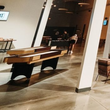 Setup of 9ft Shuffleboard Tables at Church Event