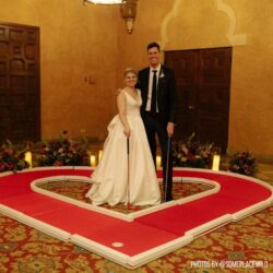 Bride and Groom in Center of Heart Mini Golf Course