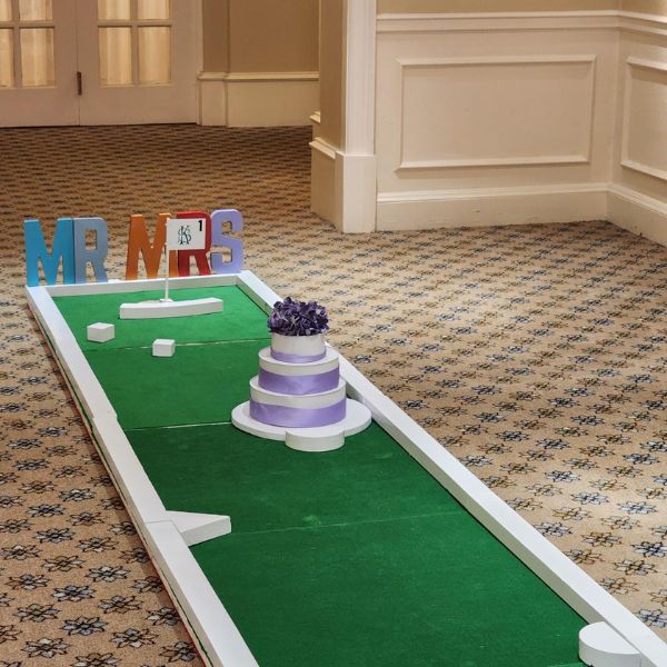 Portable Mini Golf with Wedding Cake Obstacle for Reception