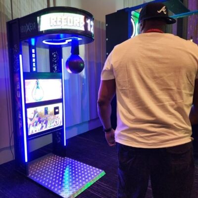 Getting Ready to punch LED Boxing Arcade Machine at Atlanta Corp Event