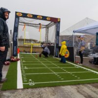 Young fan getting ready to play Field Goal Kicking Game