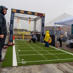 Young fan getting ready to play Field Goal Kicking Game